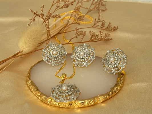 American diamond gold plated pendant set with matching ring and a complimentary chain